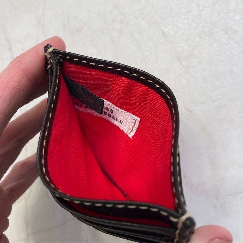 Dooney and Bourke black leather card holder sample - Picture 3 of 5